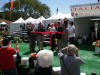 Tom McDowell cuts the ribbon kicking off Concorso Italiano